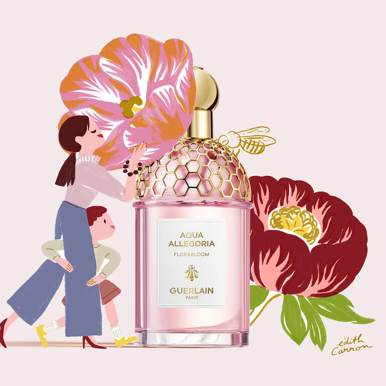 A MOTHER AND A DAUGHTER SMELLING FLOWERS NEAR AQUA ALLEGORIA FLORABLOOM EAU DE TOILETTE BY GUERLAIN